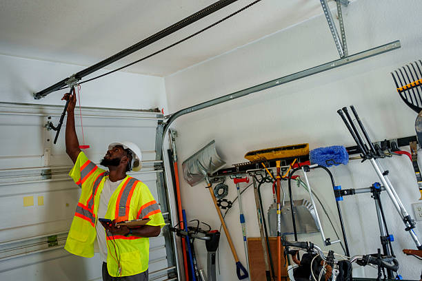 Professional Garage Door Panel Replacement technician working in Dodge City, KS